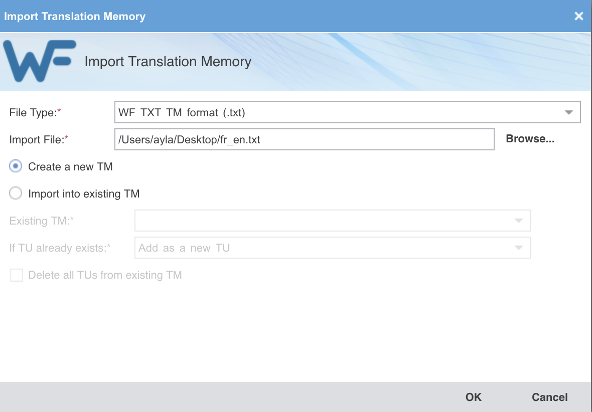 La fenêtre Import Translation Memory remplie : File Type sur WF TXT TM format (.txt), Import File sur fr_en.txt, et l'option Create a new TM sélectionnée.
