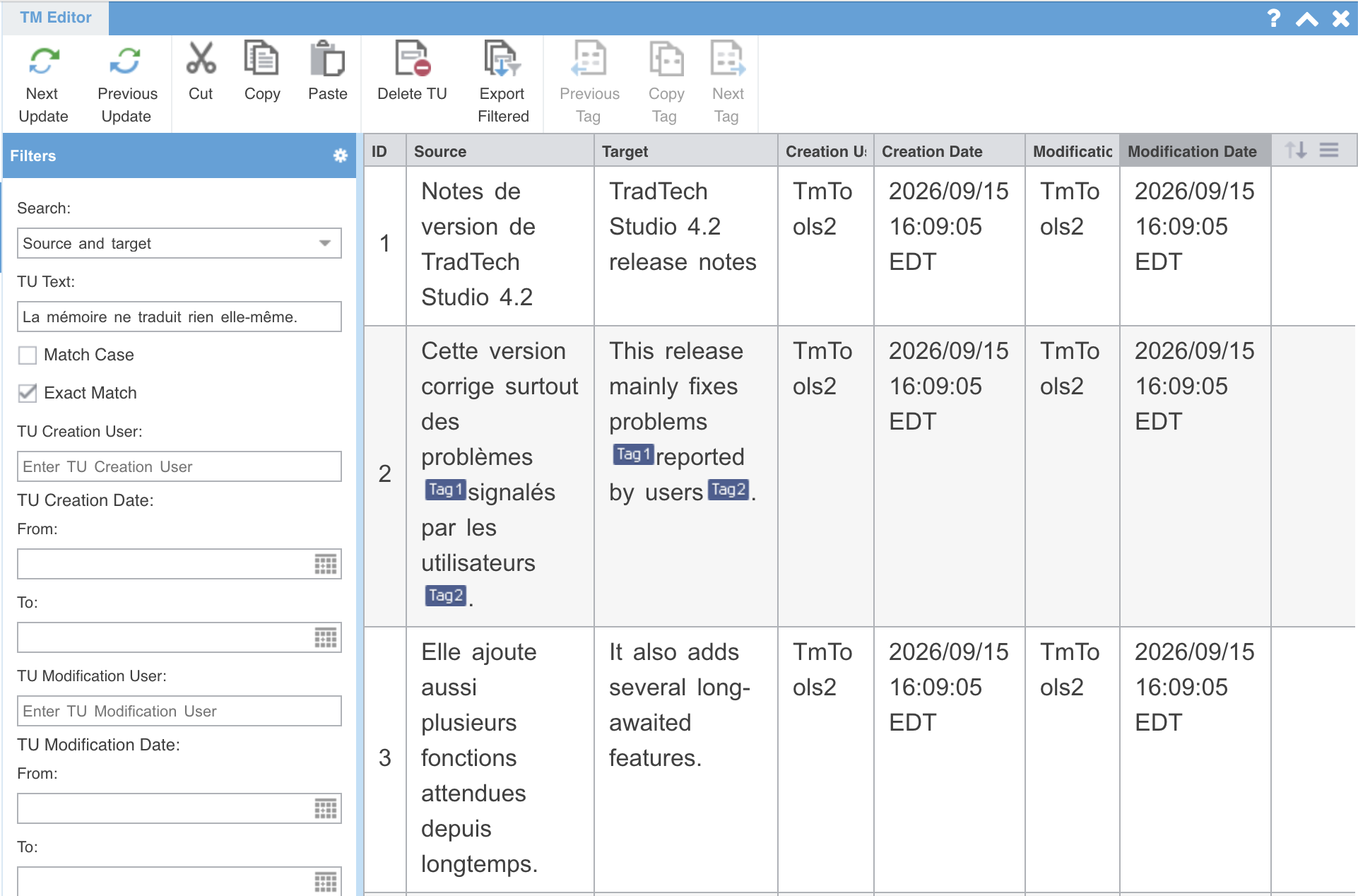 La fenêtre TM Editor ouverte sur la mémoire de l'alignement : à gauche un panneau de filtres, à droite le tableau des unités avec leur source, leur cible, l'utilisateur TmTools2 et les dates de création et de modification ; l'unité 2 porte des balises Tag 1 et Tag 2 autour de « signalés par les utilisateurs » et de « reported by users » ; en haut, les commandes Next Update, Previous Update, Cut, Copy, Paste, Delete TU et Export Filtered.