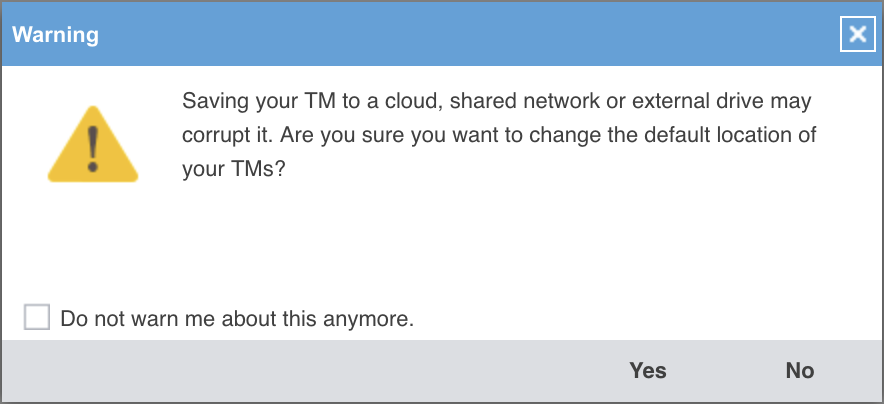 Un avertissement de Wordfast : « Saving your TM to a cloud, shared network or external drive may corrupt it. Are you sure you want to change the default location of your TMs ? », avec une case « Do not warn me about this anymore » et les boutons Yes et No.
